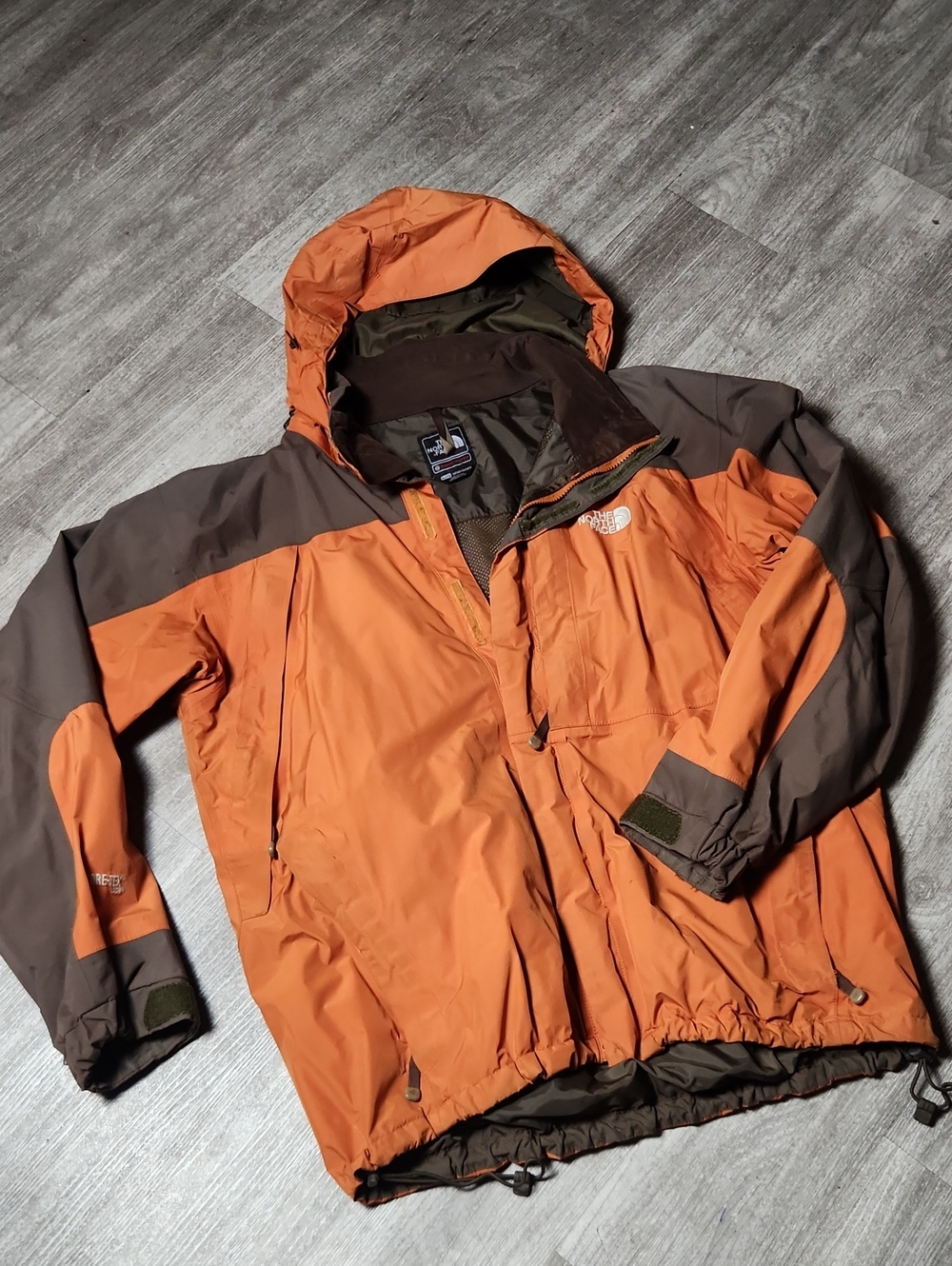 The North Face Men’s Orange and Brown Gortex Jacket